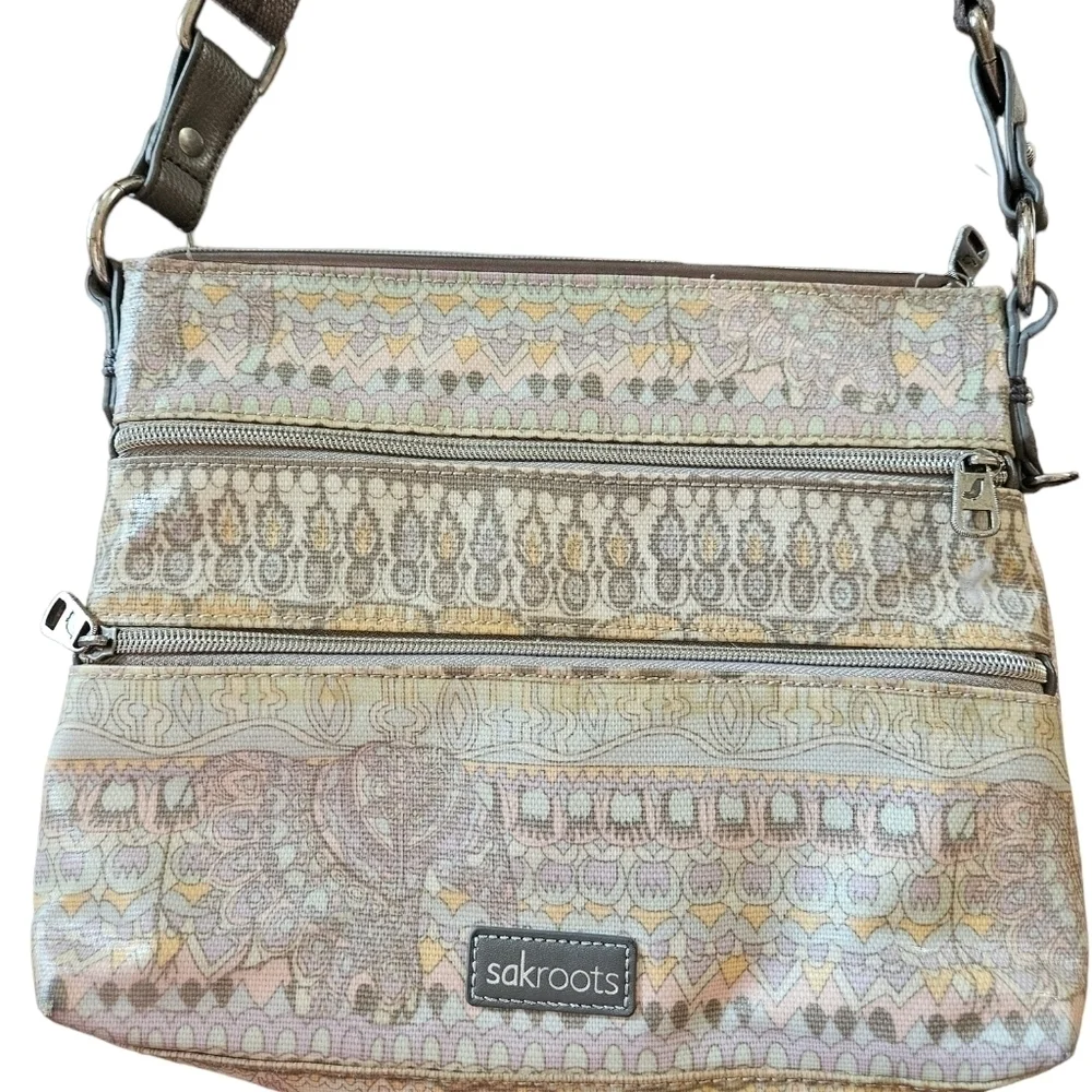 Sakroots crossbody purse with a boho vibe.